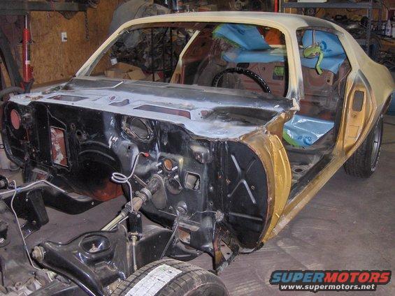 1970 Chevrolet Camaro body undergoing restoration, interior and engine bay exposed