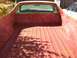 1978 Ford Ranchero - Rear view of a 1978 Ford Ranchero bed being prepped for paint, with another vehicle visible.