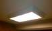 1983 Ford 427 - A bright, rectangular ceiling light fixture is shown with decorative molding around its edges.