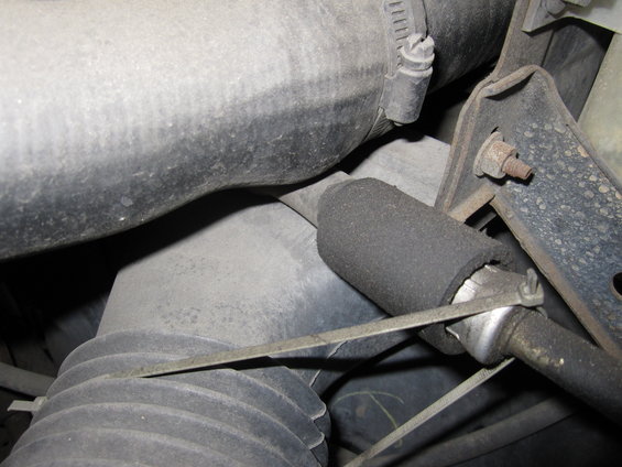 Engine bay hoses and metal bracket