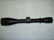 2004 Harley-Davidson Fat Boy - A Leupold brand rifle scope is shown against a light-colored background.