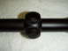 2004 Harley-Davidson Fat Boy - A black rifle scope is shown on a white, textured surface.