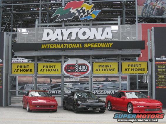 Three coupes parked at Daytona International Speedway