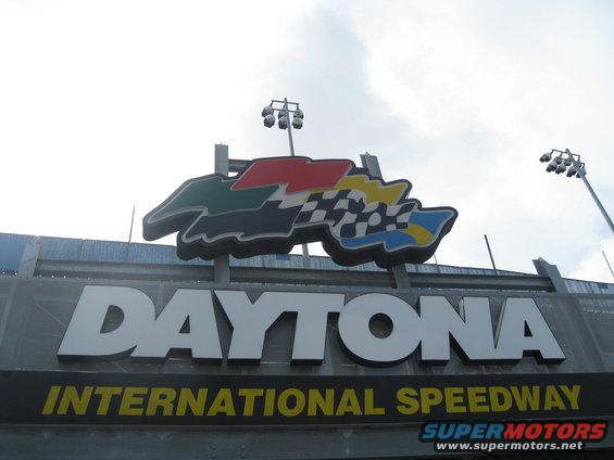 Daytona International Speedway sign with checkered flag logo
