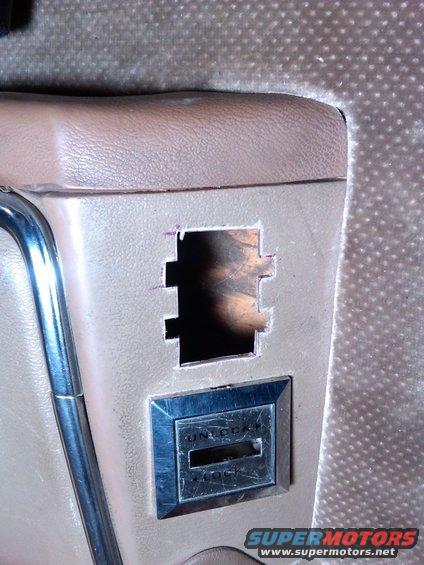 Interior panel with cut-out and unlock/lock switch