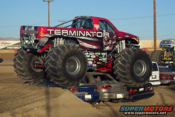 Red monster truck 'Terminator' crushing cars