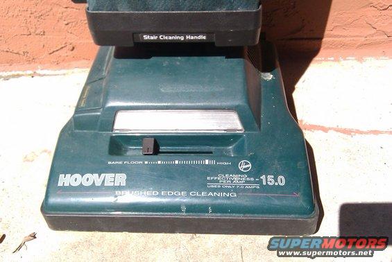 Green Hoover vacuum cleaner with "BRUSHED EDGE CLEANING" and "15.0" visible
