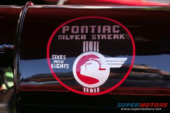 Pontiac Silver Streak Sixes and Eights emblem on black surface