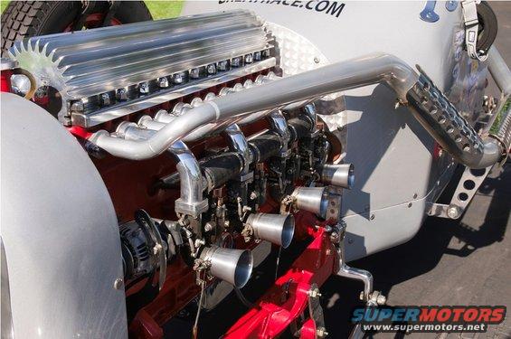 Engine with chrome intake runners and a large finned aluminum valve cover