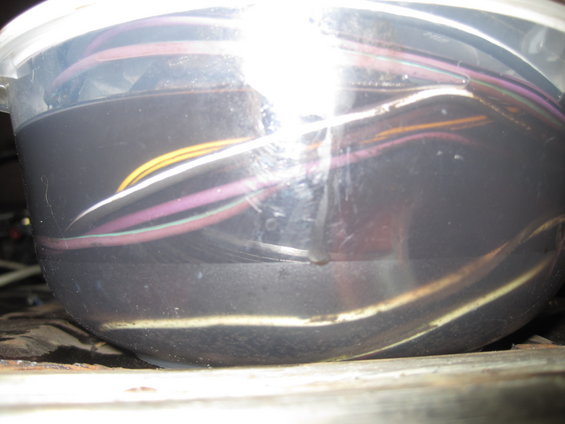 Bundle of colored electrical wires in a black plastic container