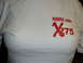 1992 Ford Mustang - A white t-shirt displays the text NDRRA.COM alongside a red graphic with an X and the number 275.