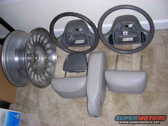 Gray steering wheels and headrests with a silver wheel rim