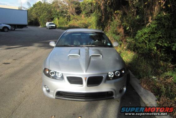 2005 GTO with SAP front facia and MPD scorpio fiberglass hood.  PFYC LED/halo projector headlights.  