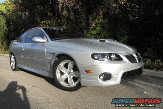 2005 GTO with RMR vented fiberglass fenders, SAP front facia and, MPD scorpio fiberglass hood.  PFYC LED/halo projector headlights.  