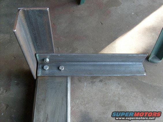 Metal bracket with three bolts