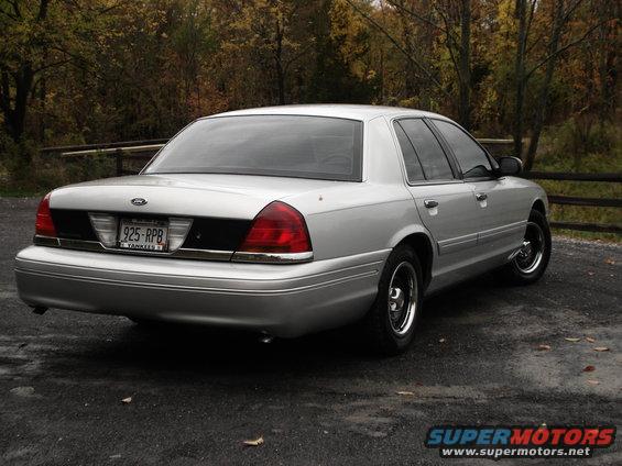 Silver 2000 Ford Crown Victoria rear view