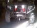 2004 Harley-Davidson Fat Boy - This ATV is viewed from the front, a prominent bumper and decorative red and white elements on its grille.
