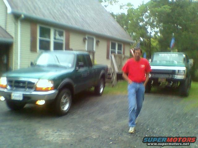 Green 2000 Ford Ranger pickup truck, 3q front view