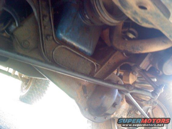 Undercarriage view showing suspension and differential