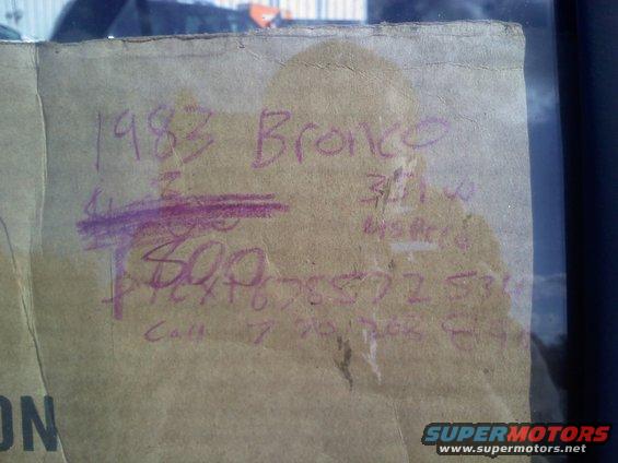 Cardboard with handwritten text: 1983 Bronco, 300, 500, phone number