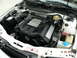 1995 Audi A6 - Close-up view of the engine bay, focusing on the V6 engine cover with Audi branding.