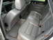 1995 Audi A6 - The interior of a 1995 Audi A6 features gray leather seats and wood trim accents.