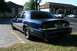 2006 Ford Crown Victoria - A dark blue 2006 Ford Crown Victoria is parked in a lot with other vehicles visible.