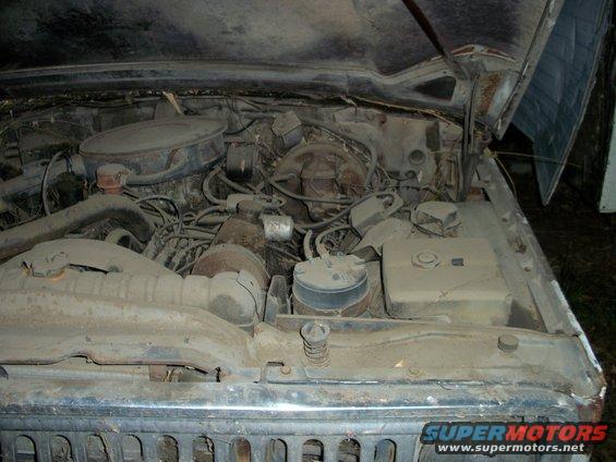 1976 Jeep J-10 engine bay with V8 engine and air cleaner