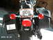 1996 Harley-Davidson Super Glide - This motorcycle has a Tennessee license plate and a sticker on its saddlebag.