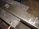 1989 Ford Bronco - A metal frame piece, possibly a bumper or chassis component, is shown with visible welds and mounting points.
