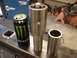 1989 Ford Bronco - Metal parts and a Monster Energy drink can are displayed on a workbench, with a Miller welding machine visible behind them.
