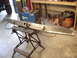 1989 Ford Bronco - Custom rear bumper assembly with hitch receivers and shackle mounts on a workbench.