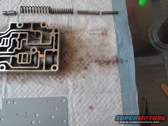 Transmission valve body and springs on a paper towel