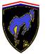 1988 Ford Bronco - This emblem features a blue horse and the letters 'FB' on a black shield with red, white, and blue stripes at the top.