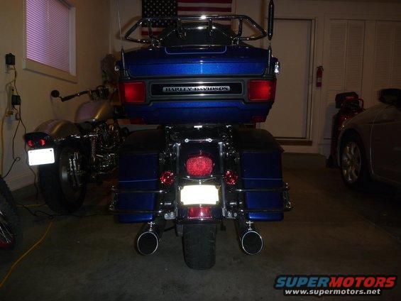 Rear view of blue 2007 Harley-Davidson Electra Glide Clsc with saddlebags and trunk