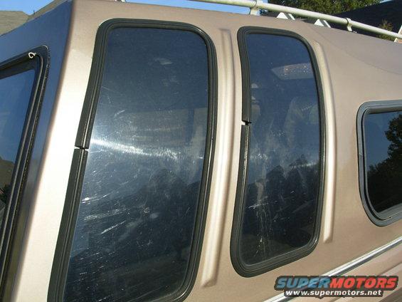 04rhst.jpg Camper window gaskets are shrinking.  They have now been sealed with RightStuff.  (See later pics)

SOLD
1997 Chevy K3500 Silverado 205Kmi 4WD 1-ton dually

E-mail me thru my profile here or search CraigsList Memphis.
NEVER WRECKED - NO MAJOR REPAIRS
Most service was done at the dealership.
- 6.5L TurboDiesel (no smoke/leaks/rattles/squeaks)
- 4L80-E
- 4.10 PosiTrac
- Light Autumnwood (camper matches)
- tilt cruise cassette PW/PL/PM/RKE
- leather steering wheel & shifter
- autodimming compass RV mirror
- single 34 gal tank
- new Curt Class V hitch receiver 
- factory skid plates (no scars)
- 7 Michelin X-Radials LT225/75R16
- 2 new batteries 2012 with stainless studded terminals

New Dorman LLT FSD 2013
Reman HydroBoost 2012
New injection pump 2010
New drivebelt 2010
New driver's inside door handle 2012
Trans flush 2010
New rear brake cylinders & shoes, axle seals 2010
New A/C compressor
New master cylinder 2009
New vacuum pump 2005
Ball joints & pitman arm 2004