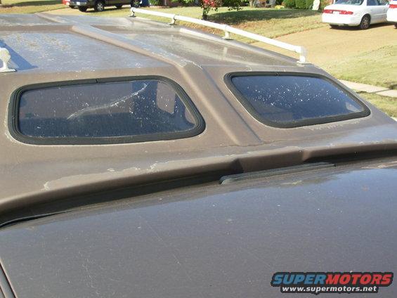 11camperwdos.jpg Camper windows damaged by trees from hurricane Rita.  Crack sealed with E6000

SOLD
1997 Chevy K3500 Silverado 205Kmi 4WD 1-ton dually

E-mail me thru my profile here or search CraigsList Memphis.
NEVER WRECKED - NO MAJOR REPAIRS
Most service was done at the dealership.
- 6.5L TurboDiesel (no smoke/leaks/rattles/squeaks)
- 4L80-E
- 4.10 PosiTrac
- Light Autumnwood (camper matches)
- tilt cruise cassette PW/PL/PM/RKE
- leather steering wheel & shifter
- autodimming compass RV mirror
- single 34 gal tank
- new Curt Class V hitch receiver 
- factory skid plates (no scars)
- 7 Michelin X-Radials LT225/75R16
- 2 new batteries 2012 with stainless studded terminals

New Dorman LLT FSD 2013
Reman HydroBoost 2012
New injection pump 2010
New drivebelt 2010
New driver's inside door handle 2012
Trans flush 2010
New rear brake cylinders & shoes, axle seals 2010
New A/C compressor
New master cylinder 2009
New vacuum pump 2005
Ball joints & pitman arm 2004