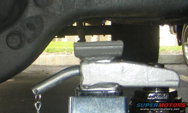 Trailer hitch receiver with pin and clip, Supermotors.net logo visible