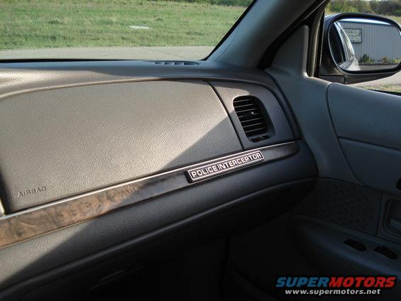 2000 Ford Crown Victoria Police Interceptor interior with dashboard and door panel visible