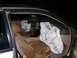 1997 Lincoln Mark VIII - The interior of a 1997 Lincoln Mark VIII shows deployed airbags and tan upholstery.