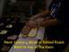 1989 Ford Bronco - A person is shown adding roast beef slices to a sandwich in a food preparation area.