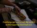 1989 Ford Bronco - A footlong sandwich is being cut in half, with care taken to prevent toppings from falling out.