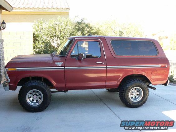 1978 Ford Bronco parked on a driveway, side view
