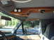 1992 Ford C-350 (Centurion Conversions) - Custom wood trim overhead console with gauges is visible inside a vehicle.