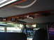 1992 Ford C-350 (Centurion Conversions) - Vehicle interior shows an aftermarket overhead console with wood trim and accessories.