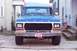 1979 Ford Bronco - This 1979 Ford Bronco is parked in front of a house, showing its grille and front end.