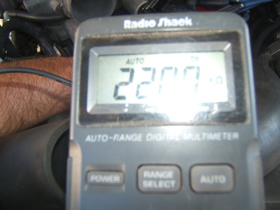 Radio Shack digital multimeter displaying 2200 ohms