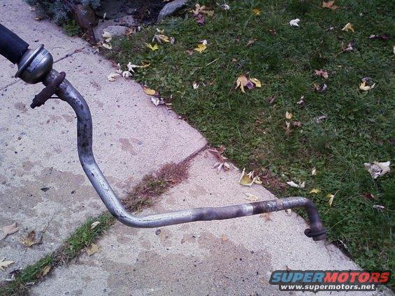 Exhaust pipe with a rubber hose and clamp