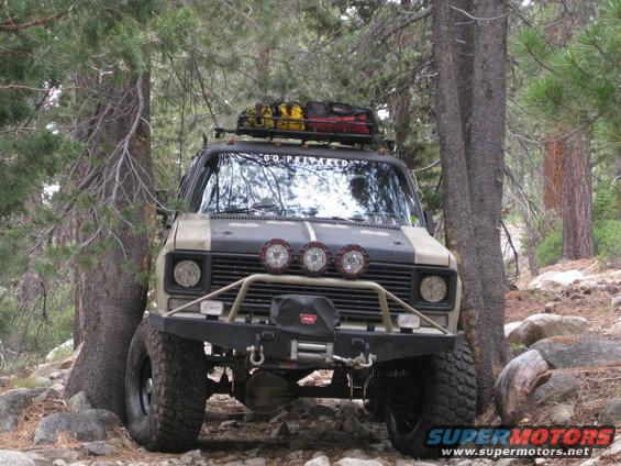 Off-road van front view with winch and roof rack