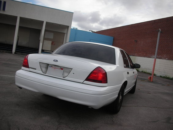 White 2004 Ford Crown Victoria rear view